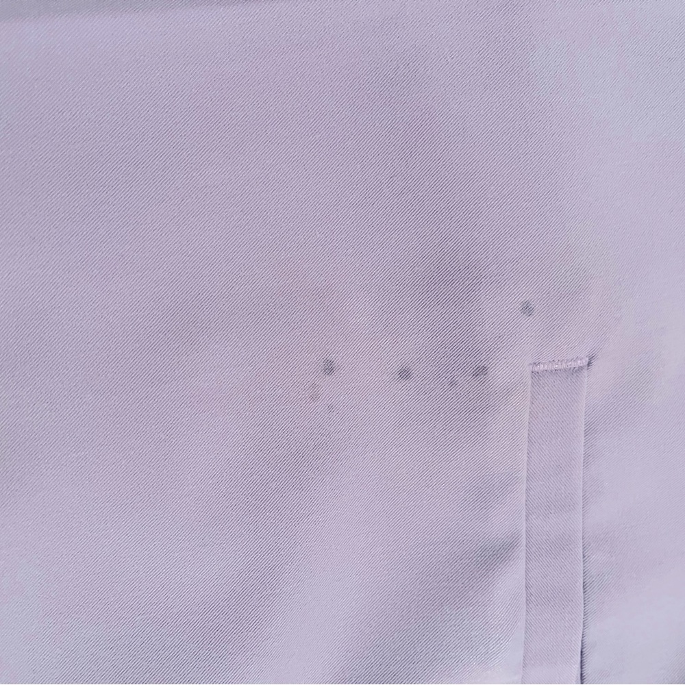 Figs scrubs like new, no holes, small ink stain on one pocket, see picture.
